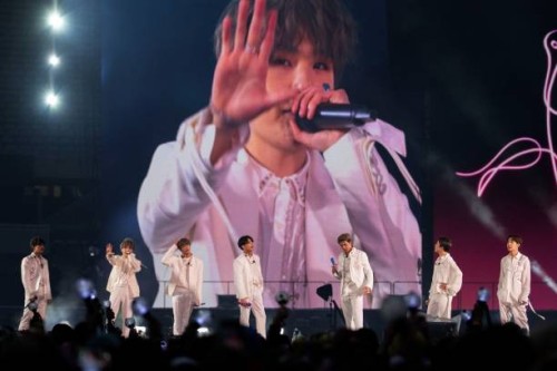South Korean K-pop band BTS performs in concert on May 11 at Soldier Field in Chicago. Jin, V, Suga, Jungkook, RM, Jimin and J-Hope will continue to...