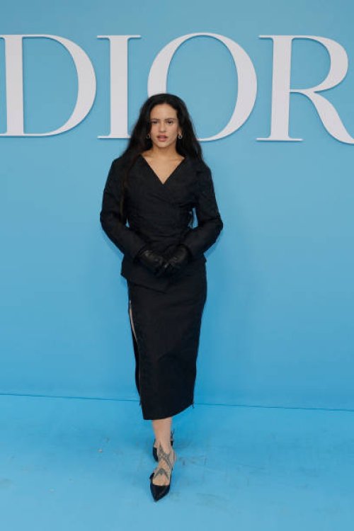 Spanish singer Rosalia poses upon arrival ahead of Christian Dior Women Ready-to-wear Spring-Summer 2025 show as part of the Paris Fashion Week, in...