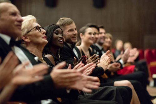 spectators clapping in the theater, close up of hands - concert stock pictures, royalty-free photos & images