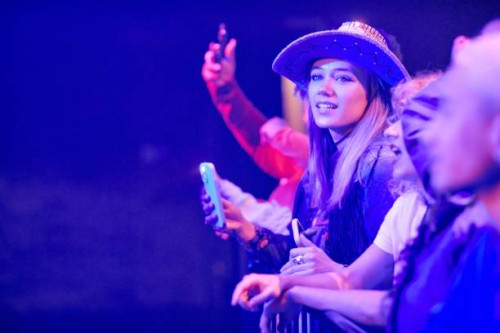 spectators recording a video with phone at a music event. - concert stock pictures, royalty-free photos & images