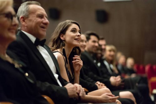 spectators sitting in the theater - concert stock pictures, royalty-free photos & images