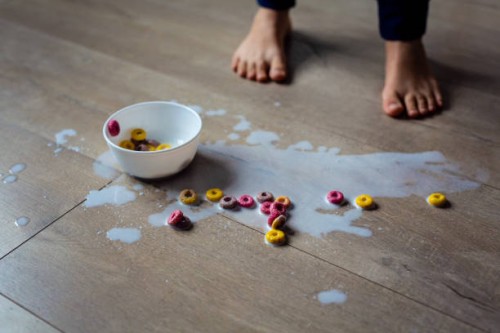 spilled bowl of milk and cereal - food stock pictures, royalty-free photos & images