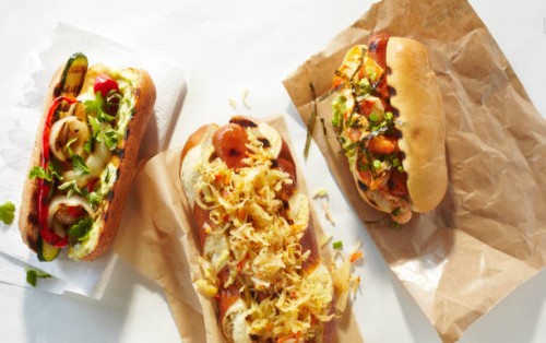 spread of three types of hot dogs - junk food stock pictures, royalty-free photos & images