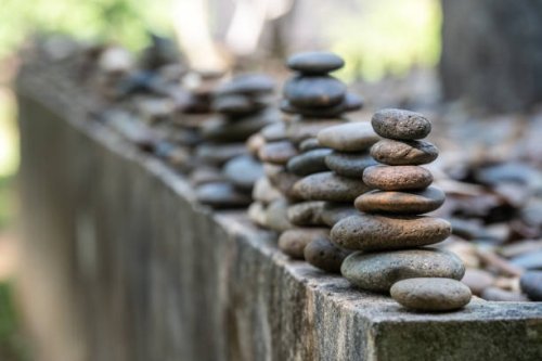 stacked stones decoration in japanese garden. - garden decoration stock pictures, royalty-free photos & images