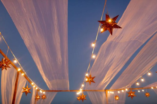 star lanterns in the evening sky with string lights - home decoration stock pictures, royalty-free photos & images