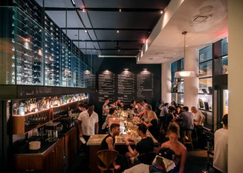 Steady crowd keeps Ardesia, a wine bar near the theater district in Midtown Manhattan, busy late into the night on Friday evening, July 29, 2022 in...