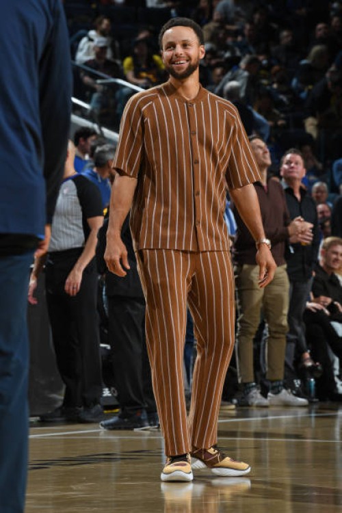 Stephen Curry of the Golden State Warriors smiles during the game against the Minnesota Timberwolves during the In-Season Tournament on November 14,...
