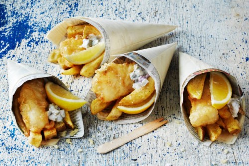 still life with fish and chips in cones - junk food stock pictures, royalty-free photos & images