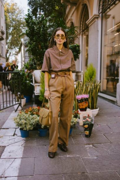 Street style as part of Milan Ready to Wear Fashion Week on September 21, 2024 in Milan, Italy.
