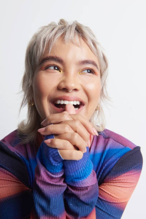 studio portrait of fashionable gen z woman - fashion stock pictures, royalty-free photos & images