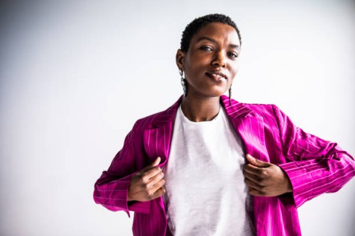 studio portrait of fashionable young woman - fashion stock pictures, royalty-free photos & images