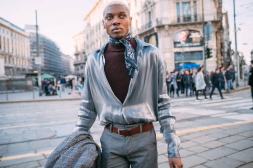 stylish man walking in street, milan, italy - fashion stock pictures, royalty-free photos & images