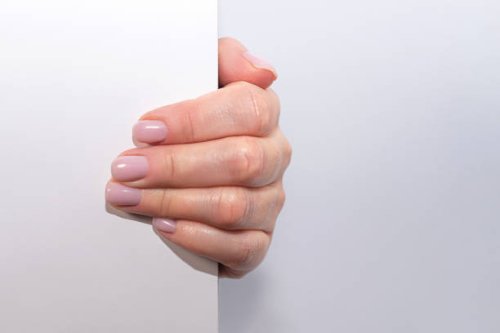 stylish pastel pink manicure on white and gray background. - nails art stock pictures, royalty-free photos & images