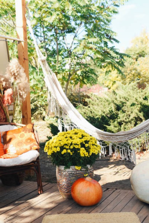 stylish van with autumn decorations. autumn season. autumn atmosphere. travel van. - garden decoration stockfoto's en -beelden