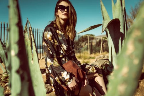 stylish woman posing between succulents. desert view - fashion stock pictures, royalty-free photos & images
