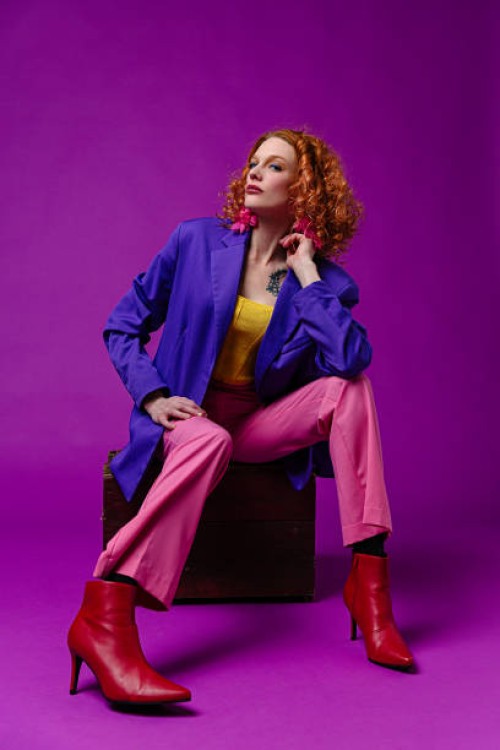 stylish woman wearing colorful clothes - fashion stock pictures, royalty-free photos & images