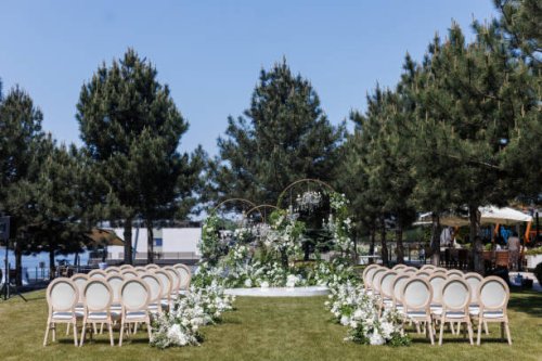 stylishly decorated outdoor wedding reception in the sun - garden decoration stock pictures, royalty-free photos & images