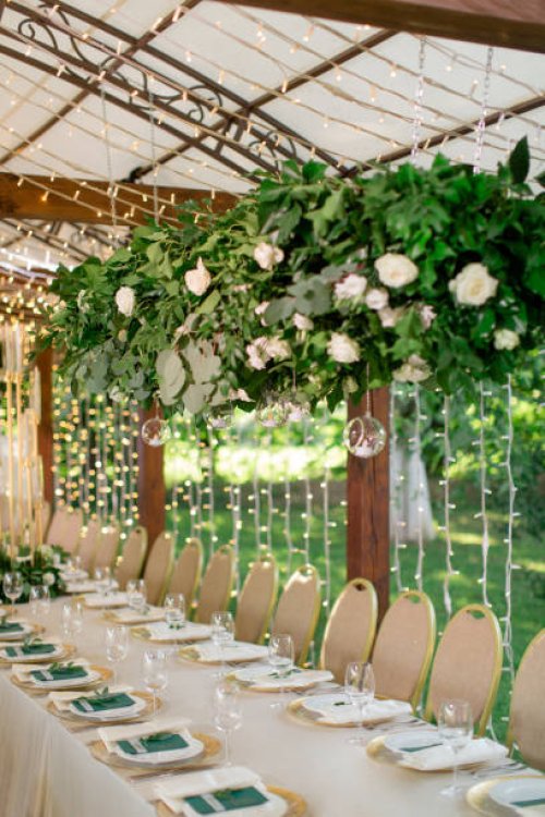stylishly decorated wedding reception on the terrace - garden decoration stock pictures, royalty-free photos & images