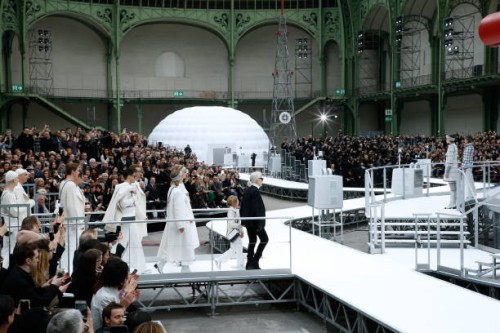 Stylist Karl Lagerfeld and his Godson Hudson Kroenig acknowledge the applause of the audience at the end of the Chanel show as part of the Paris...