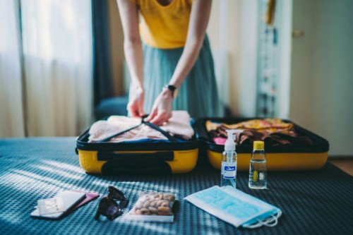 suitcase packing for travel, covid-19 - travel stock pictures, royalty-free photos & images