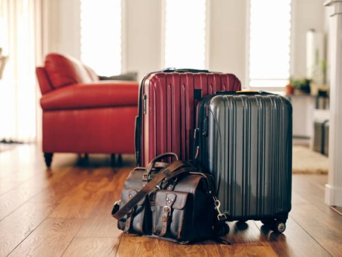 suitcases in a home ready for travel - travel stock pictures, royalty-free photos & images