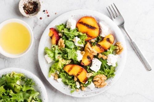 summer salad with grilled peaches and feta cheese - food stock pictures, royalty-free photos & images