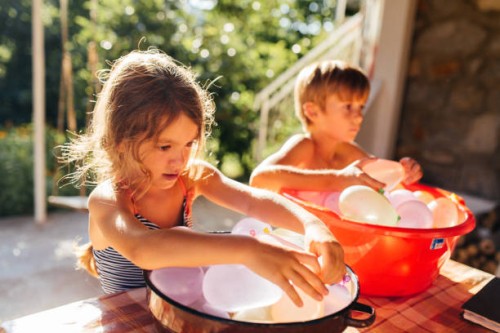 summer water bombs refresment - garden decoration stockfoto's en -beelden