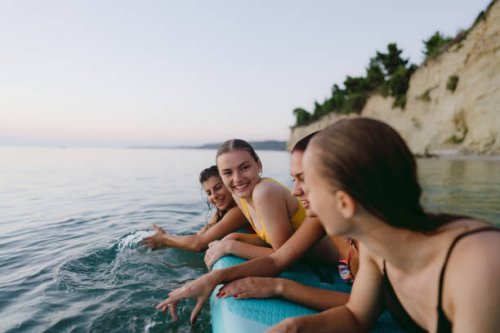 suping on the beach - travel stock pictures, royalty-free photos & images