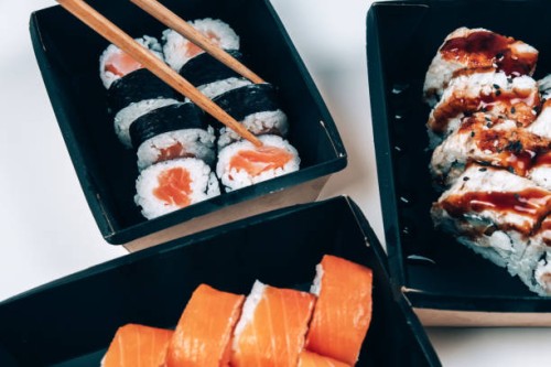 sushi in box lunches. takeaway sushi on the table. - junk food stock pictures, royalty-free photos & images