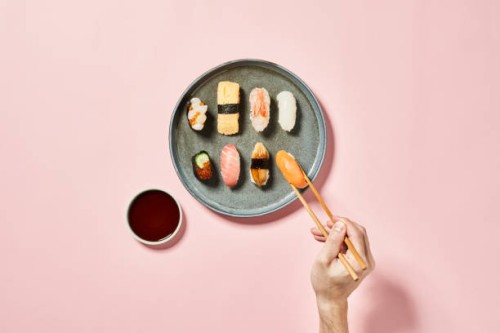 sushi with pink background - food stock pictures, royalty-free photos & images
