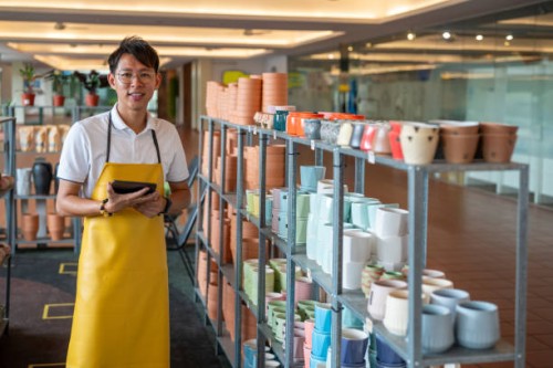 tablet tales: a potter's innovation in blooms - garden decoration stock pictures, royalty-free photos & images