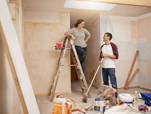 tackling their home renovations as a team - home decoration stock pictures, royalty-free photos & images