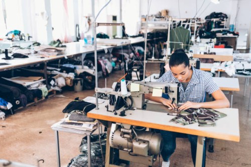 tailor and worker in chinese clothes factory - fashion stock pictures, royalty-free photos & images