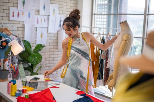 tailors working in studio - fashion stock pictures, royalty-free photos & images