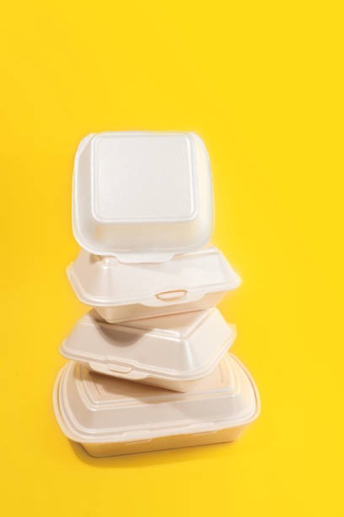 takeaway packaged food. food delivery boxes concept on trendy illuminating yellow background. - junk food stock pictures, royalty-free photos & images