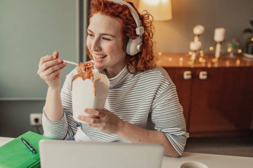 taking a lunch break while working from home - junk food stock pictures, royalty-free photos & images