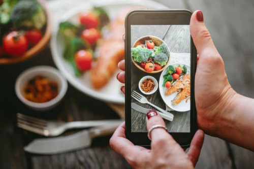 taking photos of grilled salmon steak with vegetables - food stock pictures, royalty-free photos & images