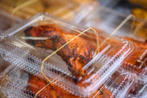 tandoori chicken legs in takeout boxes - junk food stock pictures, royalty-free photos & images