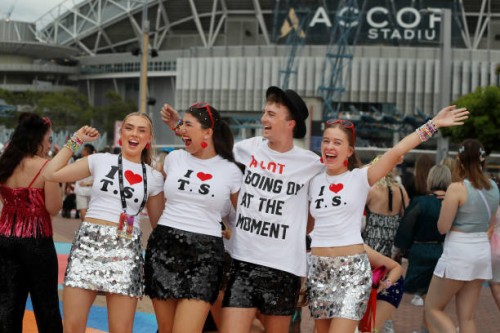 Taylor Swift fans, also known as "Swifties", pose for photographs outside Accor Stadium at Taylor Swift's first Sydney concert on February 23, 2024...