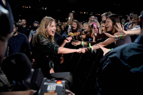 Taylor Swift, Swift interacts with her fans during the Taylor Swift reputation Stadium Tour at Gillette Stadium on July 26, 2018 in Foxborough,...