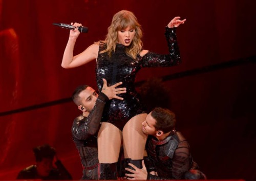 Taylor Swift, Swift performs onstage during opening night of her 2018 Reputation Stadium Tour at University of Phoenix Stadium on May 8, 2018 in...