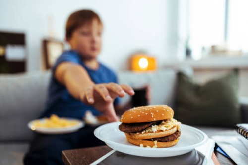 teenage boy ready for delicious burger - junk food stock pictures, royalty-free photos & images