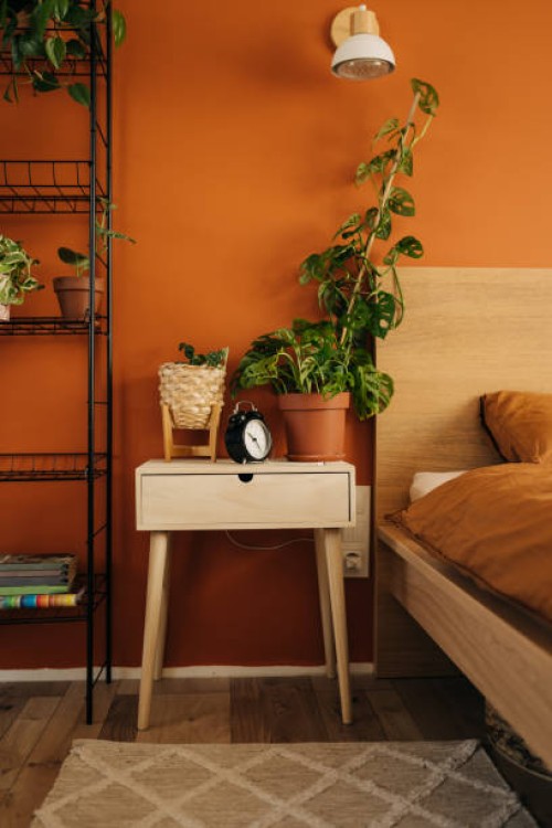 terracotta wall in bedroom with two beds - fashion stock pictures, royalty-free photos & images