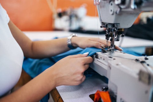 textile industry workers - fashion stock pictures, royalty-free photos & images