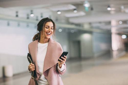 texting in the subway parking lot - fashion stock pictures, royalty-free photos & images
