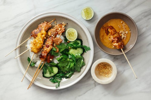 thai chicken satay with peanut sauce - food stock pictures, royalty-free photos & images