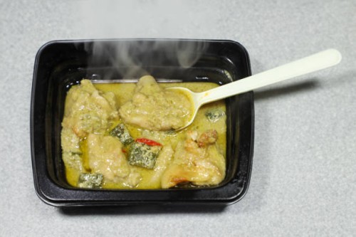 thai green curry takeout - aromatic and ready to eat - junk food stock pictures, royalty-free photos & images