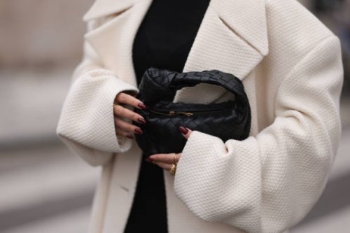 Thanya Wong seen wearing Polène Paris gold jewelry / rings, Vautrait cream white oversized wool short coat / jacket, COS black high neck top and...