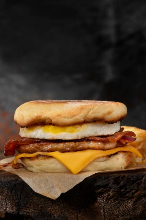 the copycat "mighty muffin" breakfast sandwich - junk food stock pictures, royalty-free photos & images