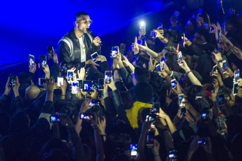 The crowd take photographs with camera phones as Daniel Daley of DVSN performs along the front row at The O2 Kentish Town Forum on March 17, 2018 in...